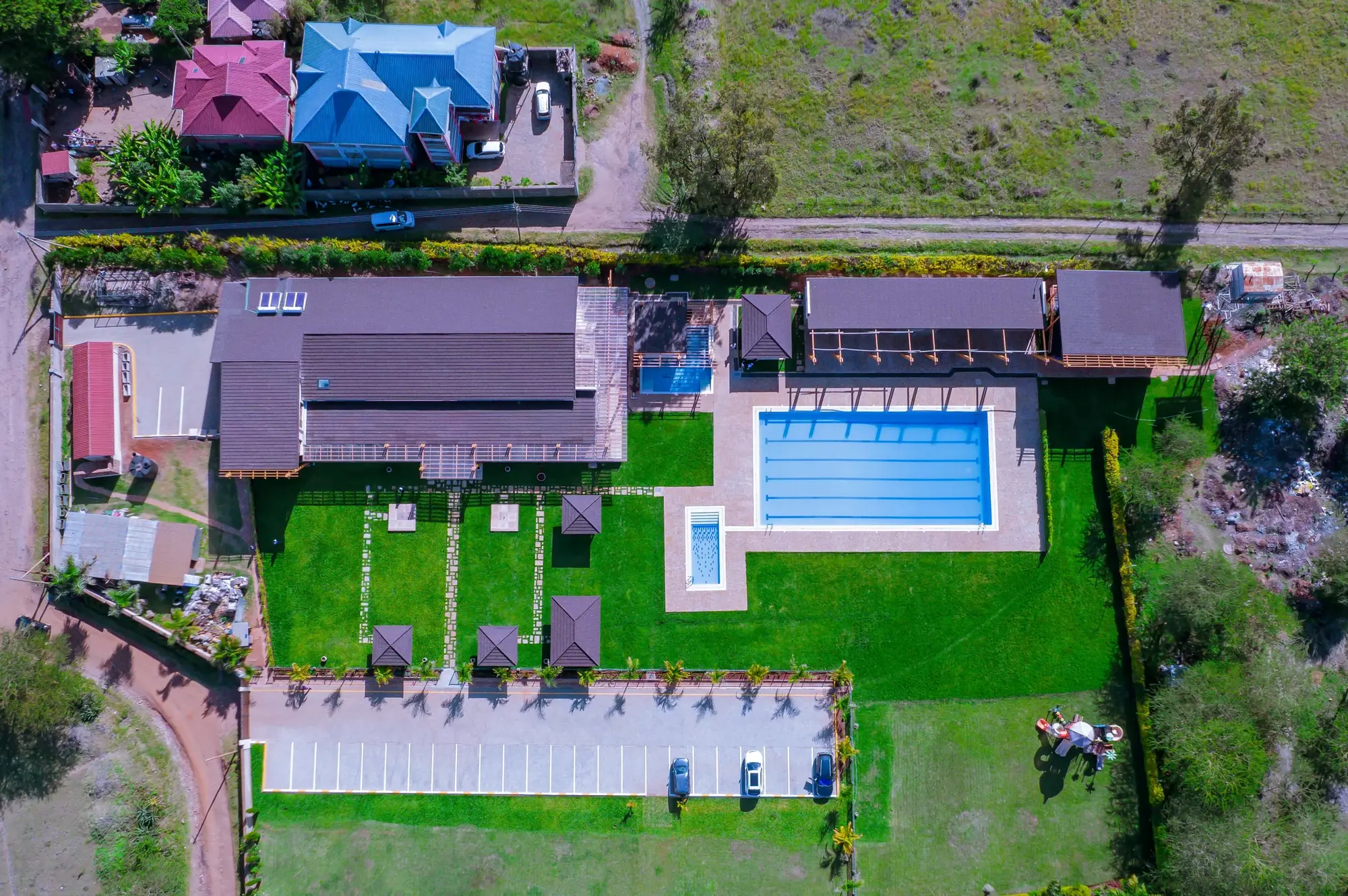 Aerial view of the pool complex and pergola structures